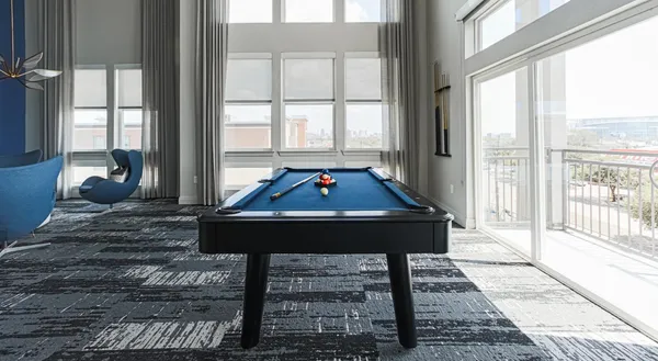 a living room with a table or chairs and a wooden floor