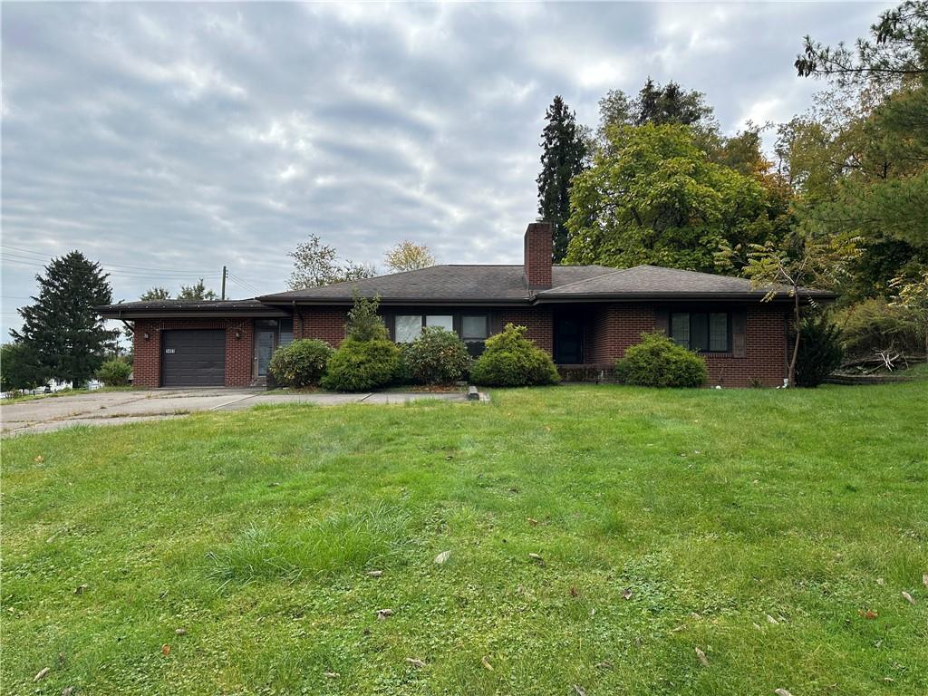 1451 4th Street Monongahela, PA 15063 - Photo 1 of 16 a view of a house with a garden