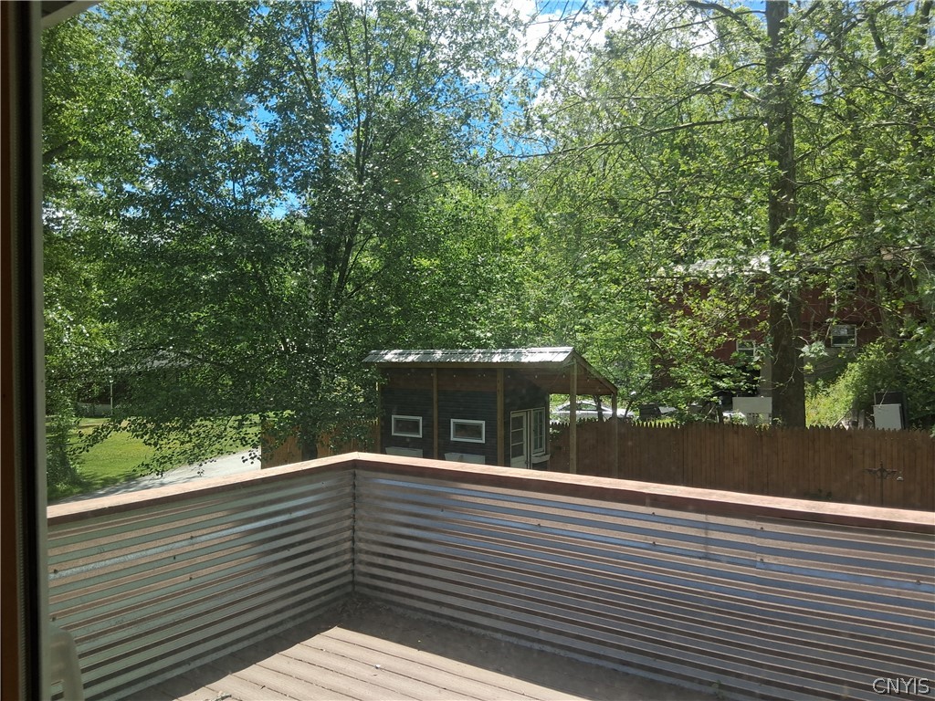 77 Shelter Valley Road Newfield, NY 14867 - Photo 13 of 37 private back deck
