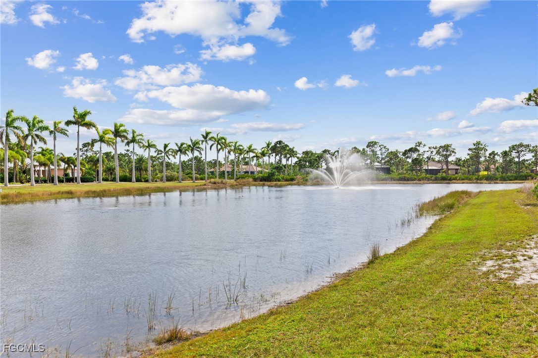 6057 Calusa Rdg Trail Bokeelia, FL 33922 - Photo 33 of 44 a view of a lake with a big yard