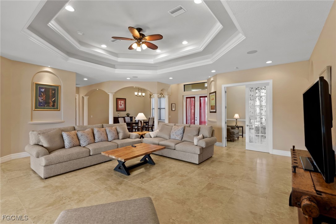 6057 Calusa Rdg Trail Bokeelia, FL 33922 - Photo 5 of 44 a living room with furniture and a flat screen tv