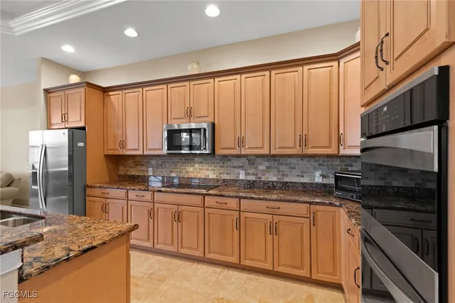 a view of a livingroom with workspace and a couch