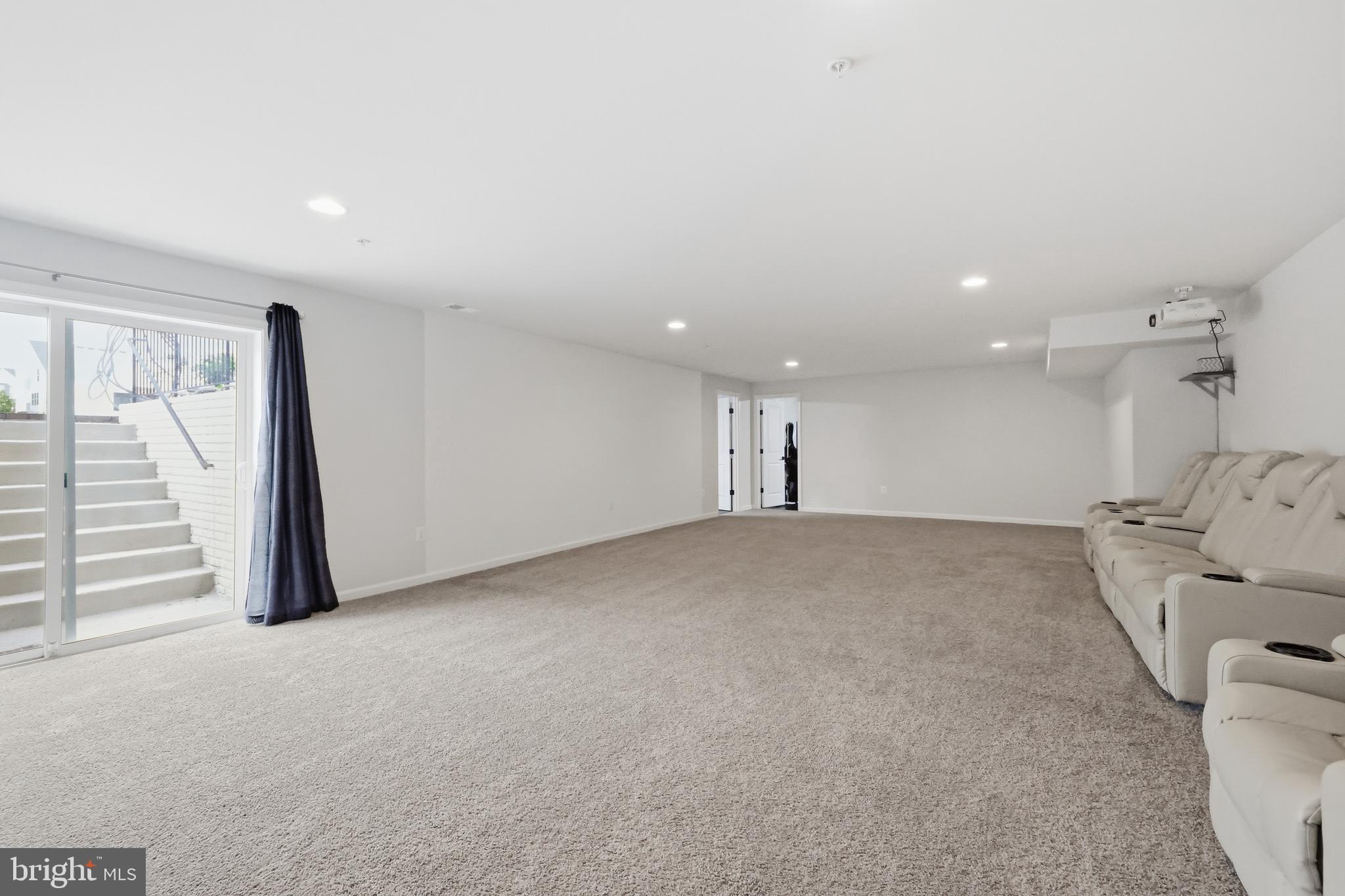 5707 Hawk Ridge Road Frederick, MD 21704 - Photo 60 of 109 a view of a livingroom with a furniture and a ceiling fan