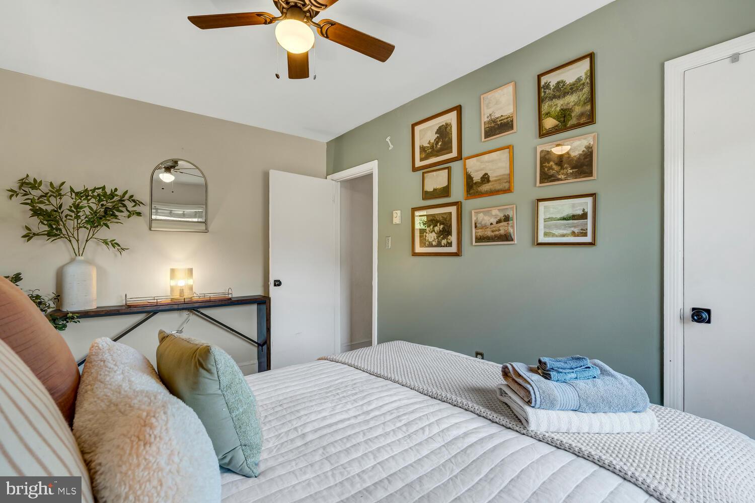 6235 South Page Valley Road Luray, VA 22835 - Photo 51 of 52 Serene bedroom with artistic charm.