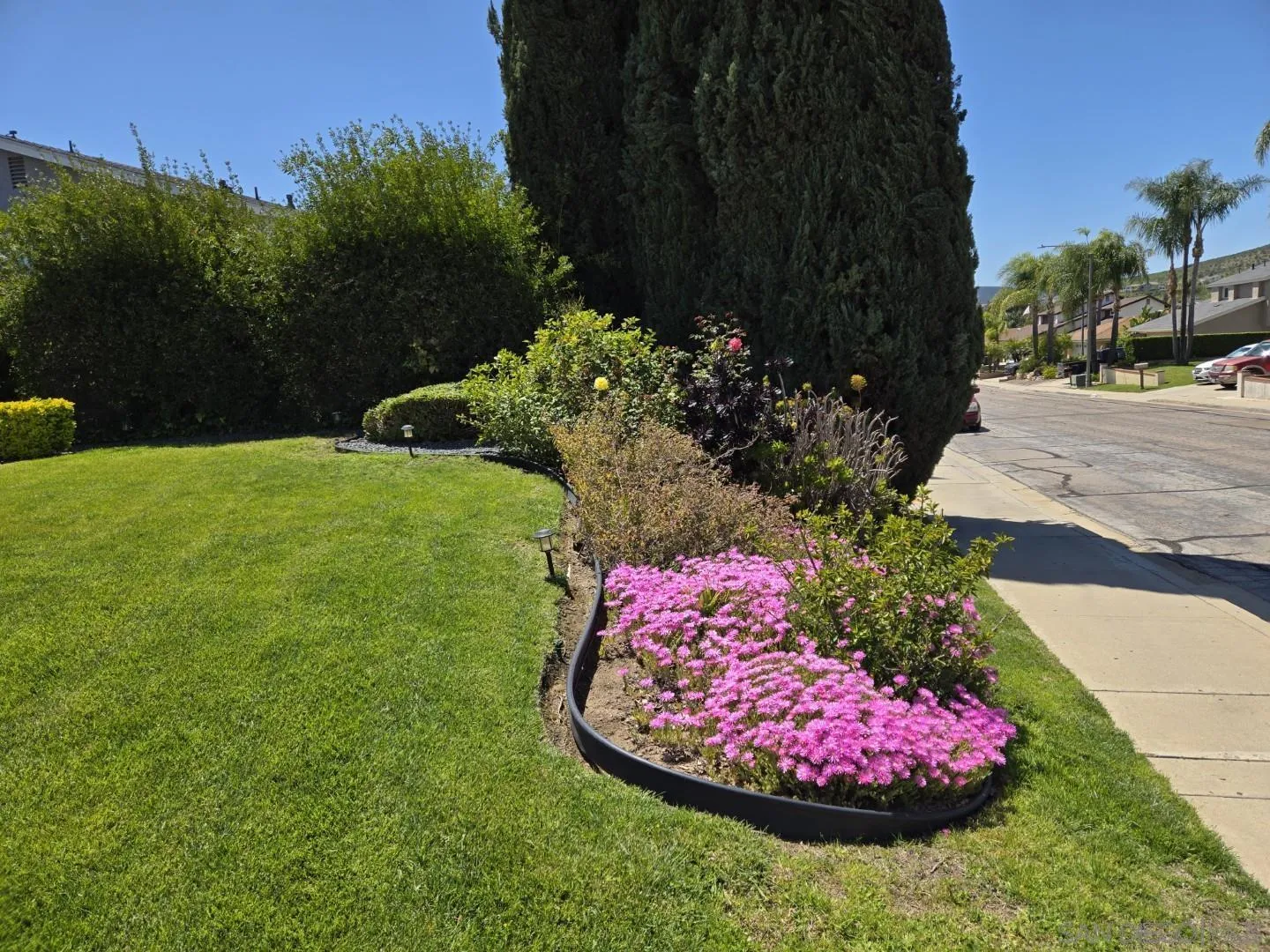 9343 Lake Hill Road Santee, CA 92071 - Photo 2 of 23 a view of a backyard of the house