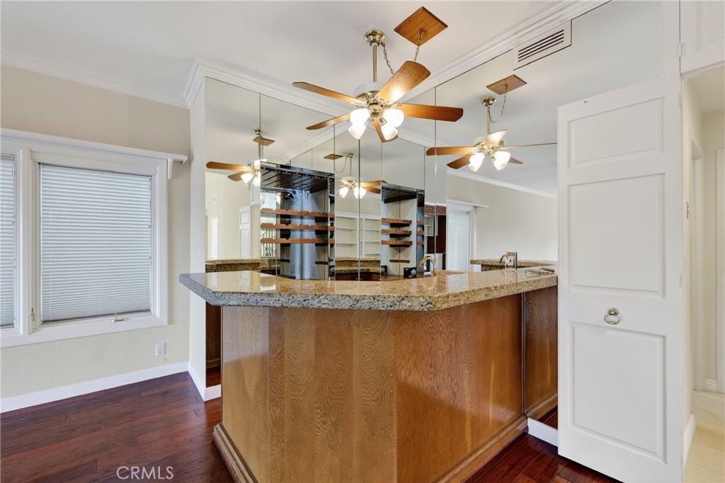 28741 Springfield Drive Laguna Niguel, CA 92677 - Photo 11 of 34 a view of kitchen with living room and wooden floor