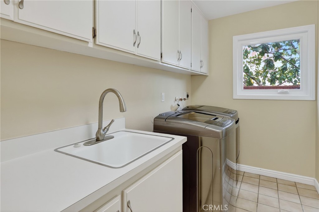 28741 Springfield Drive Laguna Niguel, CA 92677 - Photo 13 of 34 a kitchen with a sink and a stove top oven