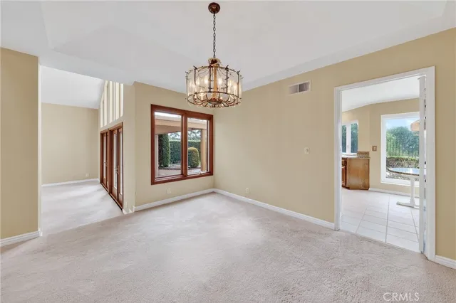 a view of entryway and hall with a front door