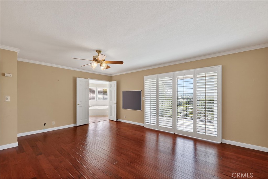 28741 Springfield Drive Laguna Niguel, CA 92677 - Photo 17 of 34 a view of an empty room with wooden floor and a window