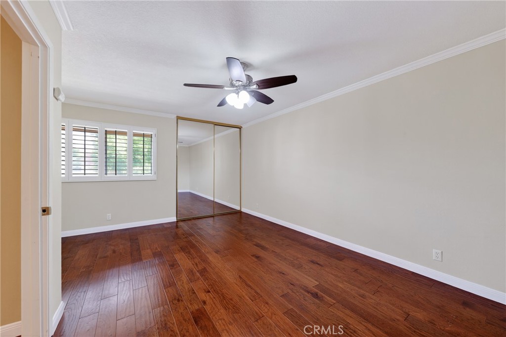28741 Springfield Drive Laguna Niguel, CA 92677 - Photo 27 of 34 an empty room with wooden floor and windows