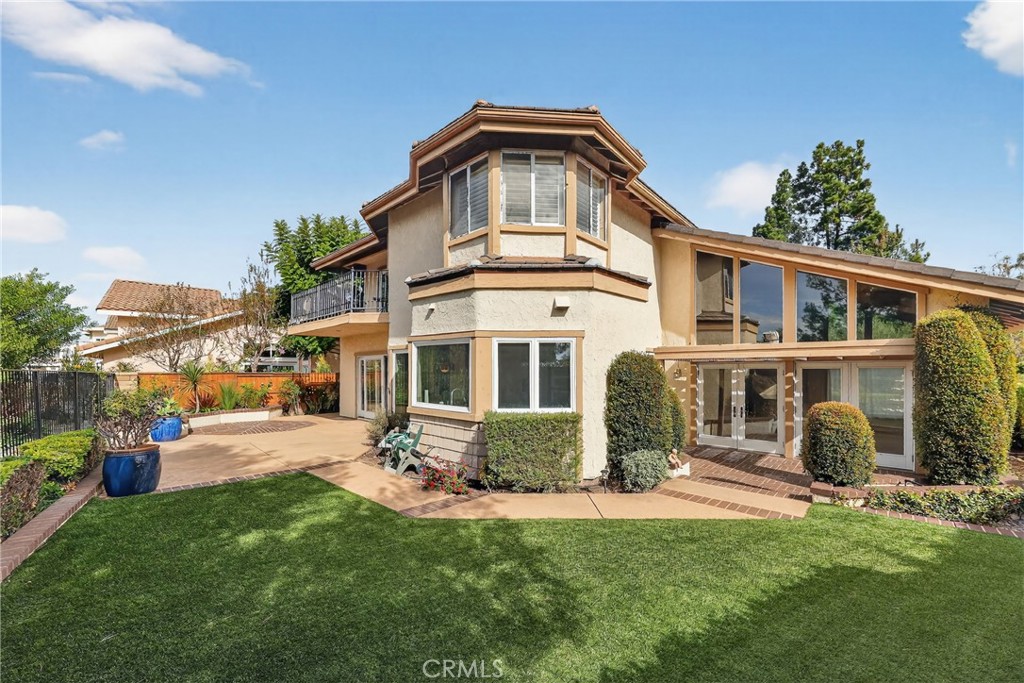 28741 Springfield Drive Laguna Niguel, CA 92677 - Photo 29 of 34 a front view of a house with a yard