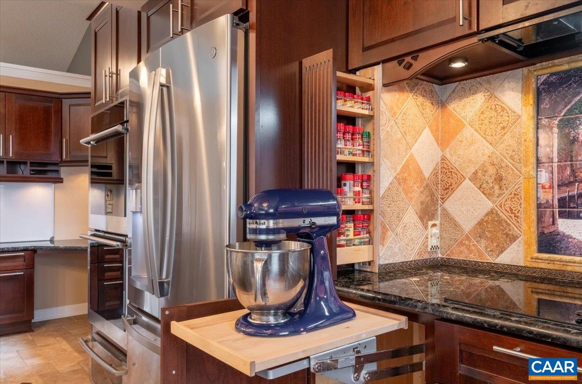 716 Preddy Creek Road Barboursville, VA 22923 - Photo 20 of 73 a kitchen with stainless steel appliances granite countertop a refrigerator and a stove