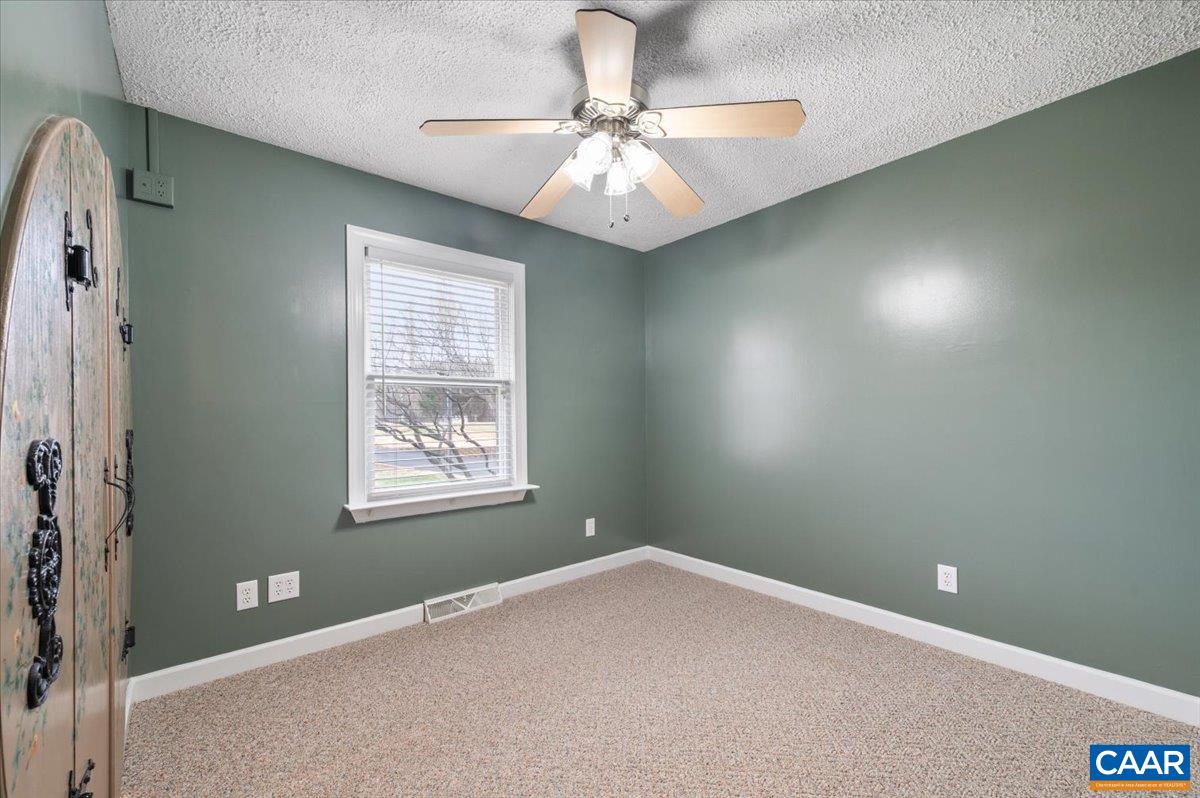 716 Preddy Creek Road Barboursville, VA 22923 - Photo 29 of 73 a view of an empty room with a window