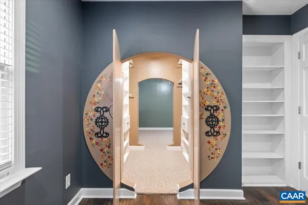 a view of a storage & utility room with two washing machine