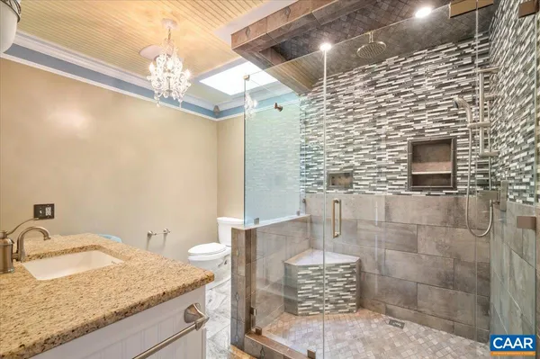 a room with a dresser and a window