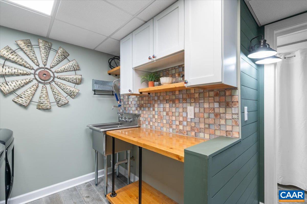 716 Preddy Creek Road Barboursville, VA 22923 - Photo 57 of 73 a bathroom with a sink and a mirror