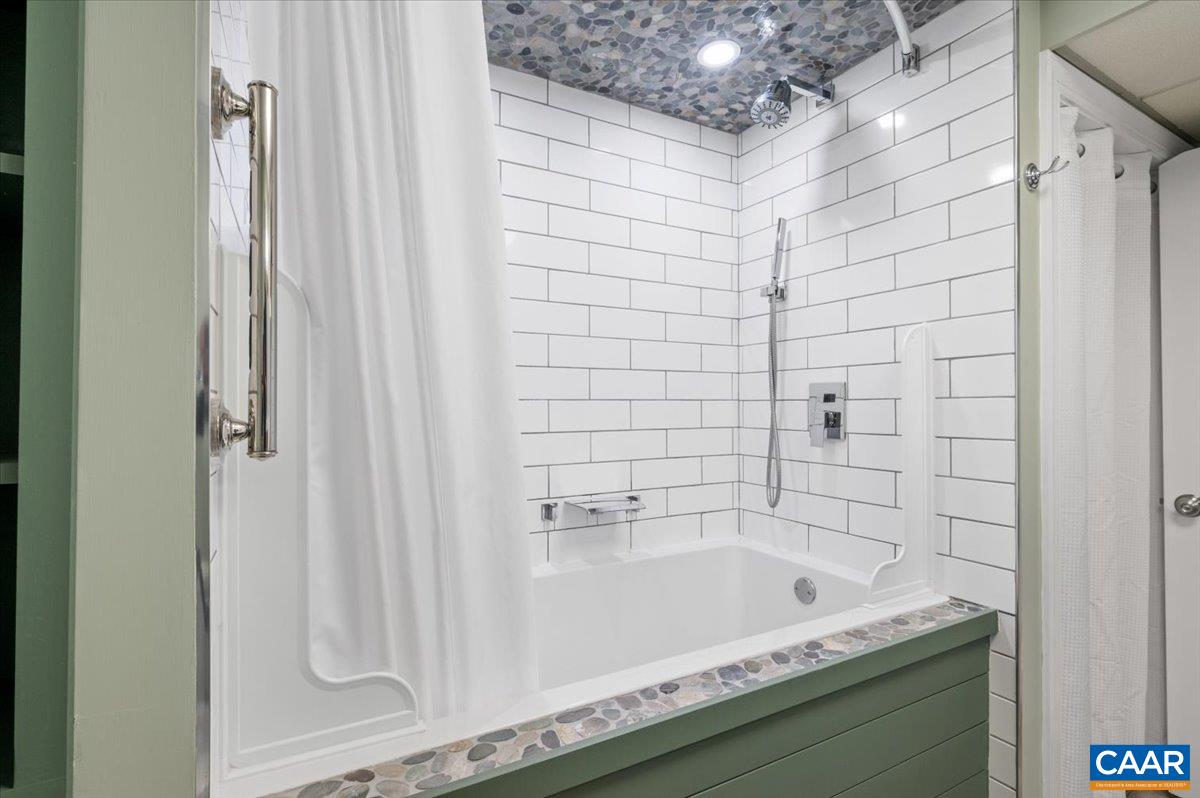 716 Preddy Creek Road Barboursville, VA 22923 - Photo 58 of 73 a bathroom with a bathtub and shower