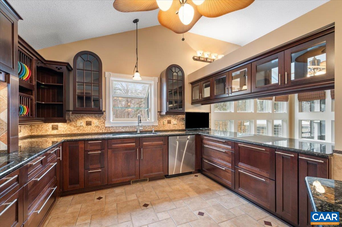 716 Preddy Creek Road Barboursville, VA 22923 - Photo 10 of 73 a large kitchen with stainless steel appliances granite countertop a stove and a sink