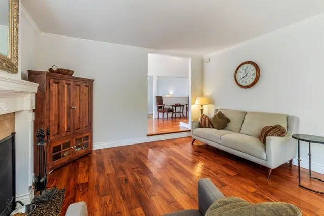 a large kitchen with stainless steel appliances kitchen island granite countertop a sink and cabinets