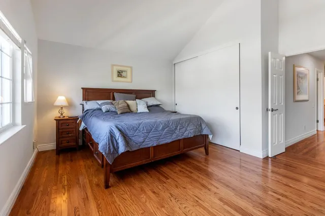 a view of a patio with table and chairs and wooden floor