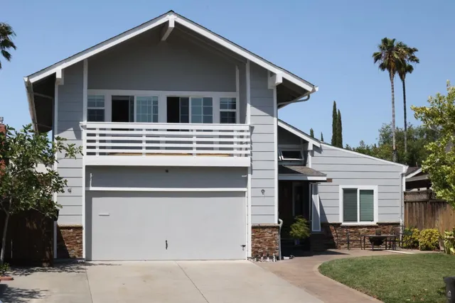 an aerial view of a house with a garden view