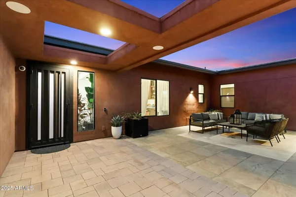 a view of a livingroom with furniture and a livingroom