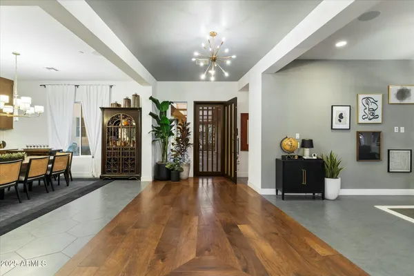 a kitchen with a table and chairs in it