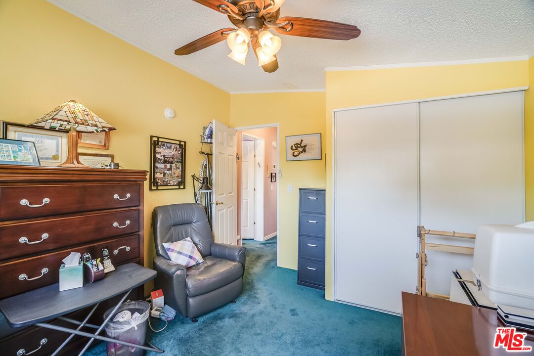 1111 Cherokee Topanga, CA 90290 - Photo 14 of 21 a living room with furniture and a flat screen tv