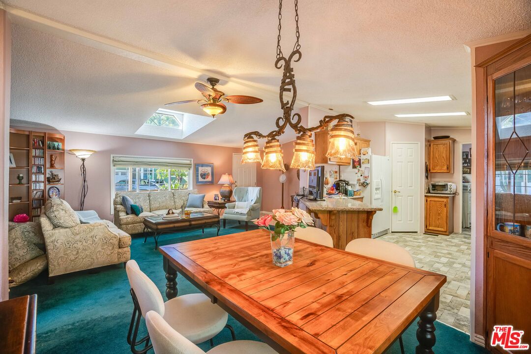 1111 Cherokee Topanga, CA 90290 - Photo 2 of 21 a view of a dining room with furniture