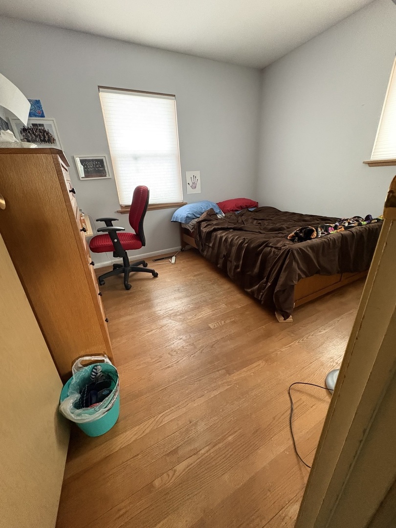 170 Cherrywood Road Buffalo Grove, IL 60089 - Photo 5 of 8 a bedroom with a bed and window