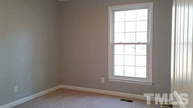 2647 Umstead Road Durham, NC 27712 - Photo 14 of 21 an empty room with a window