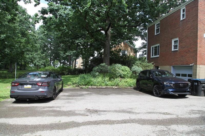 8077 Peebles Road Pittsburgh, PA 15237 - Photo 8 of 9 a car parked in front of a house