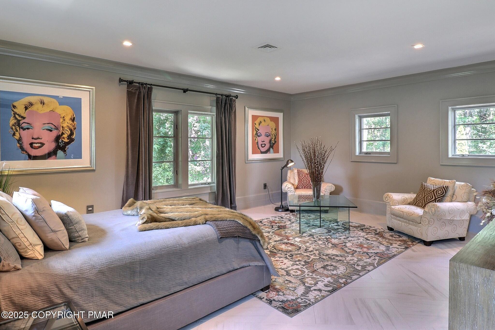 1212 Burger Hollow Road Effort, PA 18330 - Photo 110 of 138 a bedroom with a large bed couch and a window