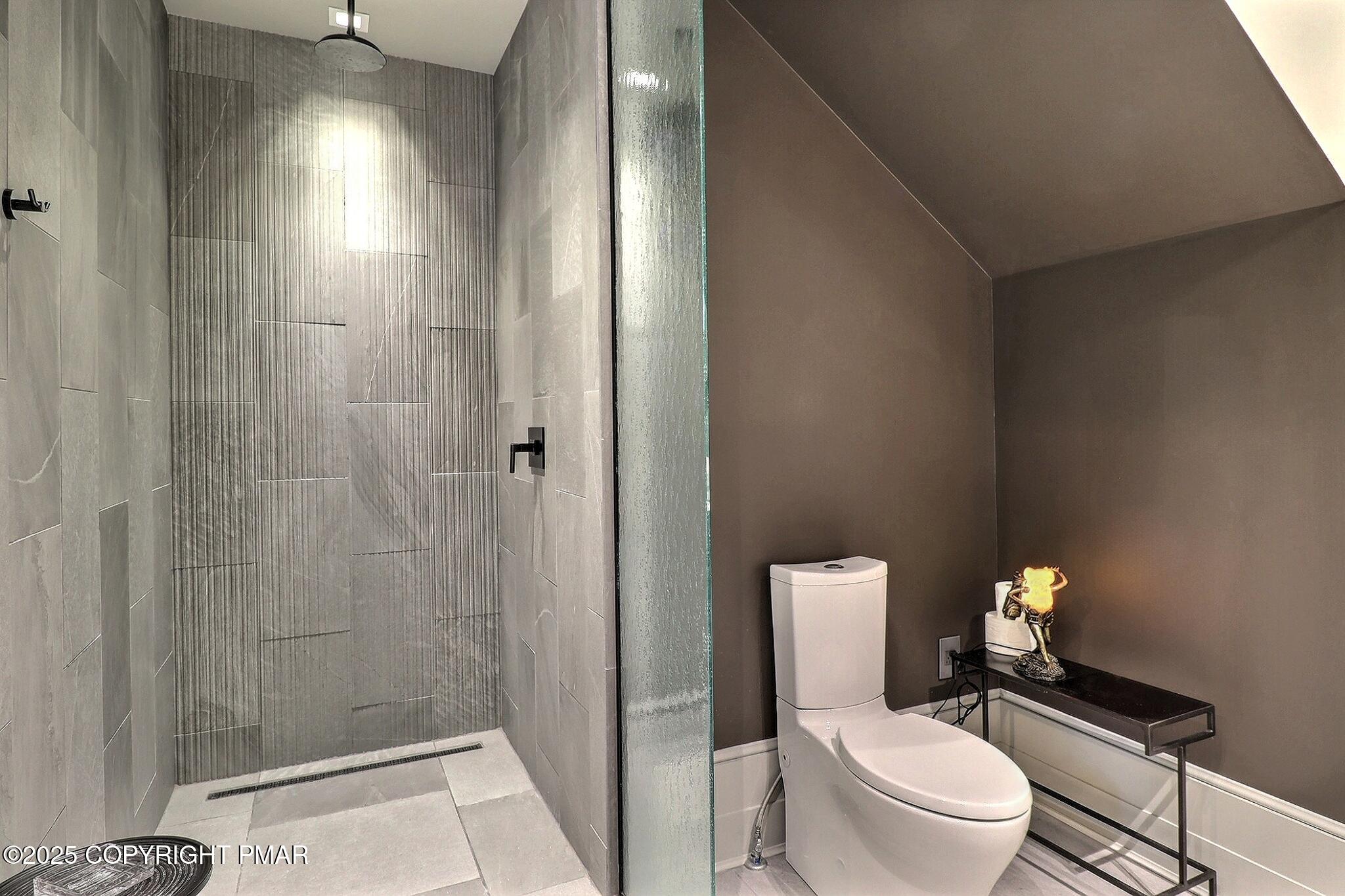 1212 Burger Hollow Road Effort, PA 18330 - Photo 113 of 138 a white toilet sitting next to a bathroom sink