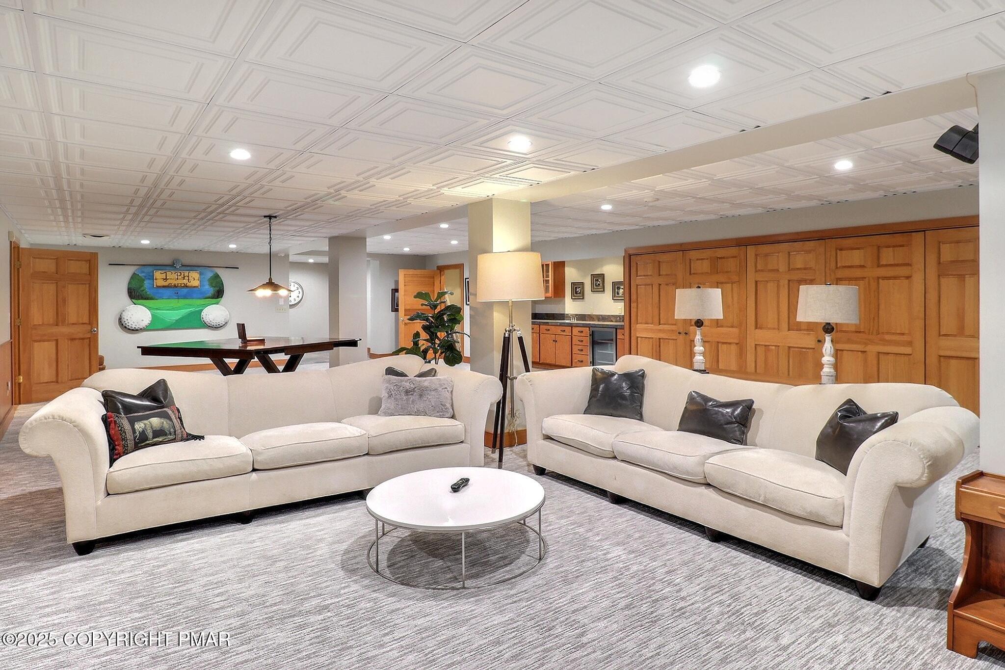 1212 Burger Hollow Road Effort, PA 18330 - Photo 118 of 138 a living room with furniture and a large window