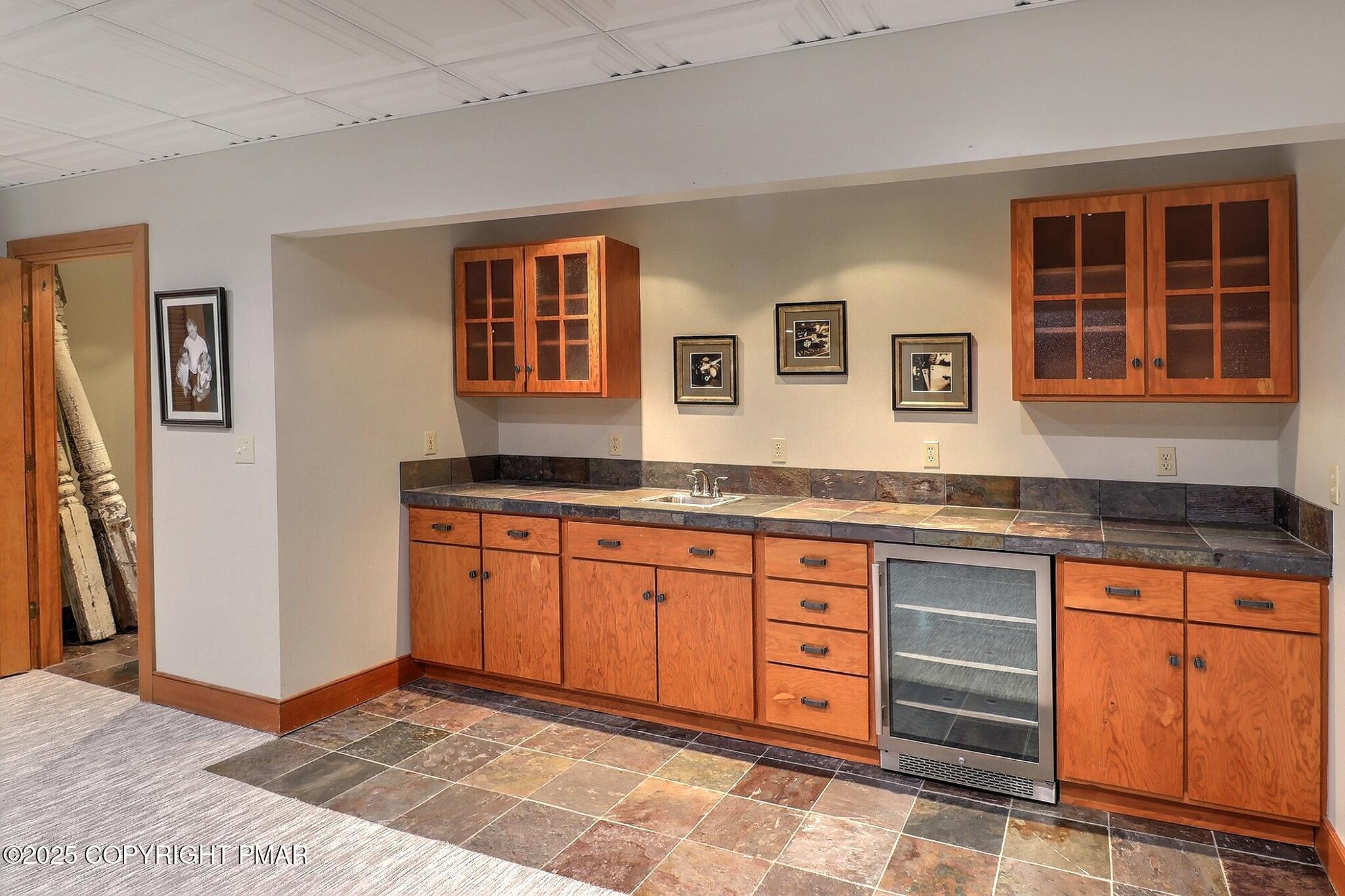 1212 Burger Hollow Road Effort, PA 18330 - Photo 119 of 138 a spacious bathroom with a granite countertop sink and a window