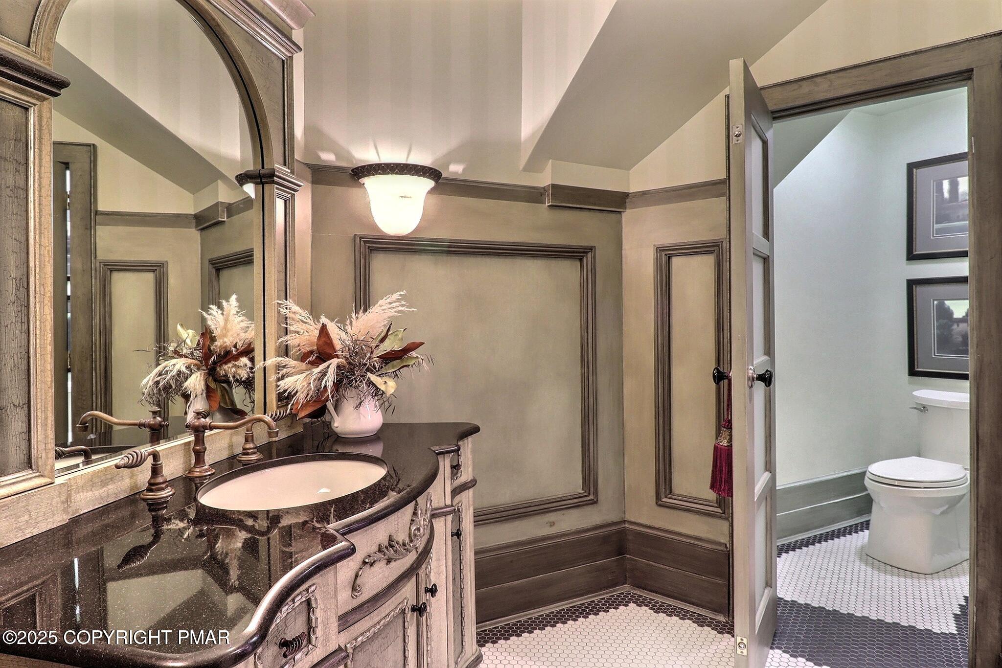 1212 Burger Hollow Road Effort, PA 18330 - Photo 121 of 138 a bathroom with a sink toilet a mirror and shower