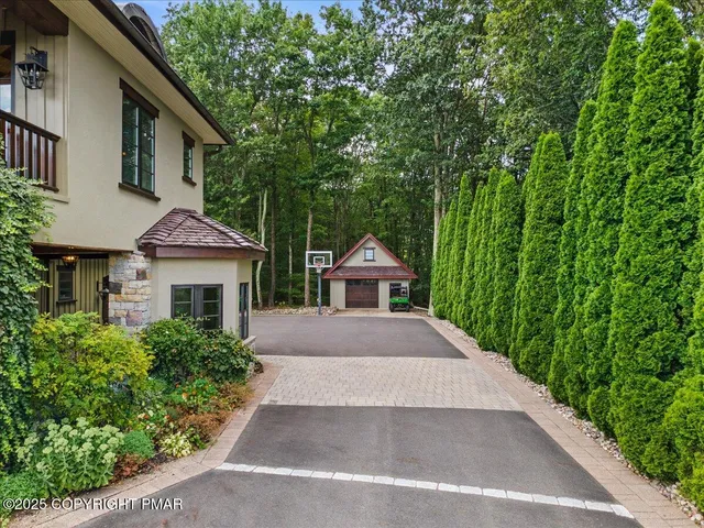 a living room with furniture a rug and a fireplace