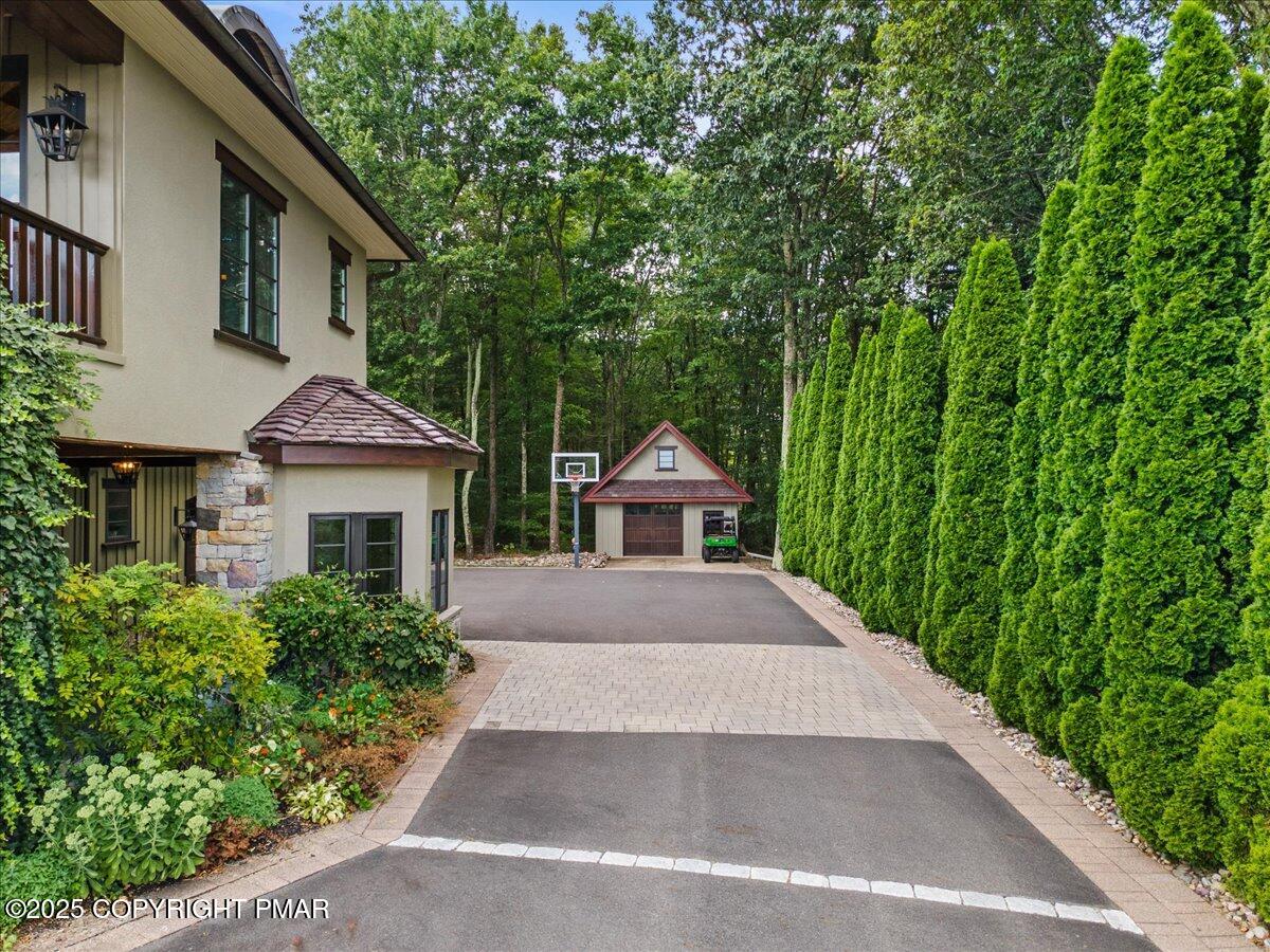1212 Burger Hollow Road Effort, PA 18330 - Photo 16 of 138 a front view of a house with a yard and trees