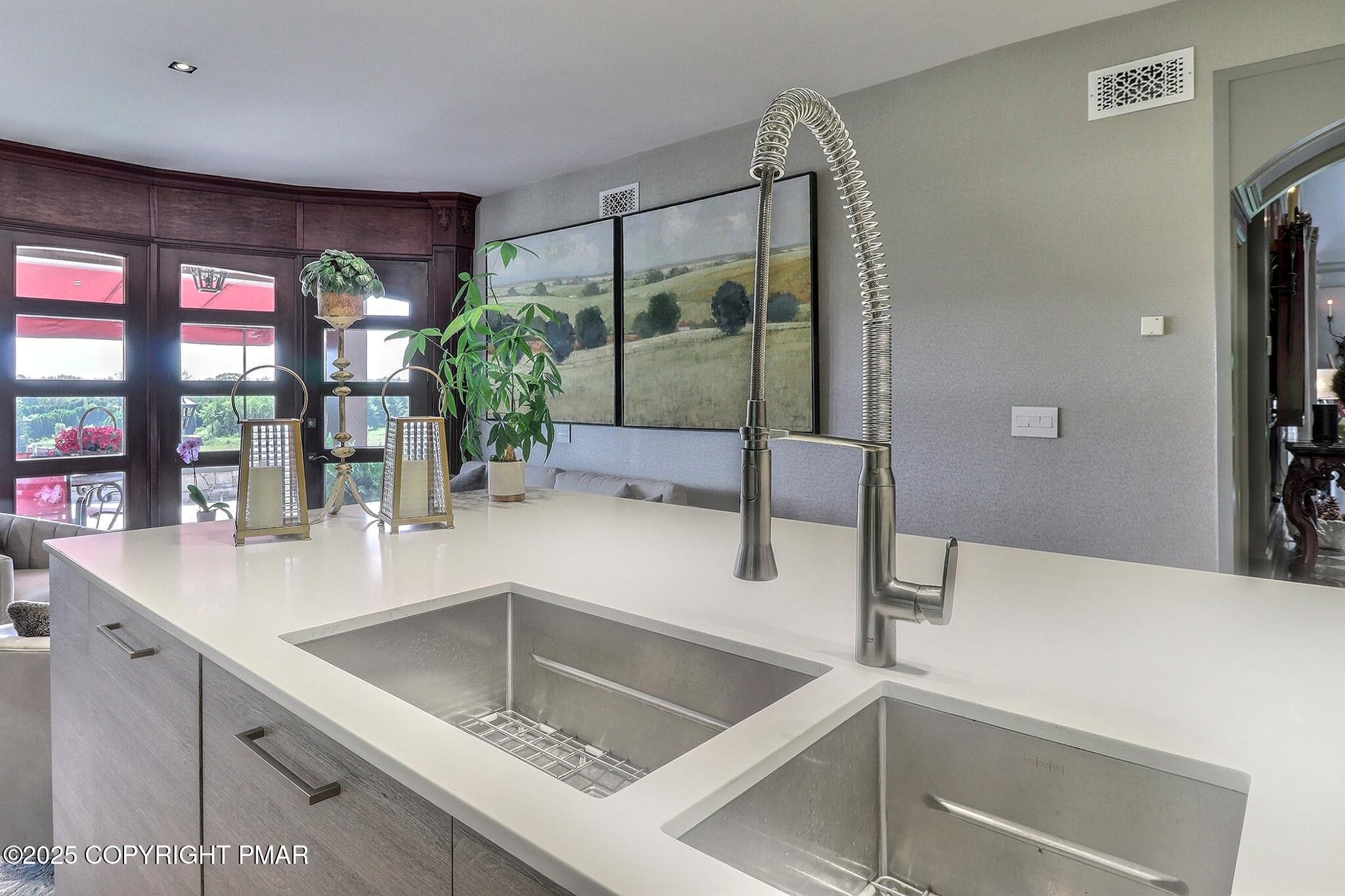 1212 Burger Hollow Road Effort, PA 18330 - Photo 33 of 138 a kitchen with a sink and a large mirror