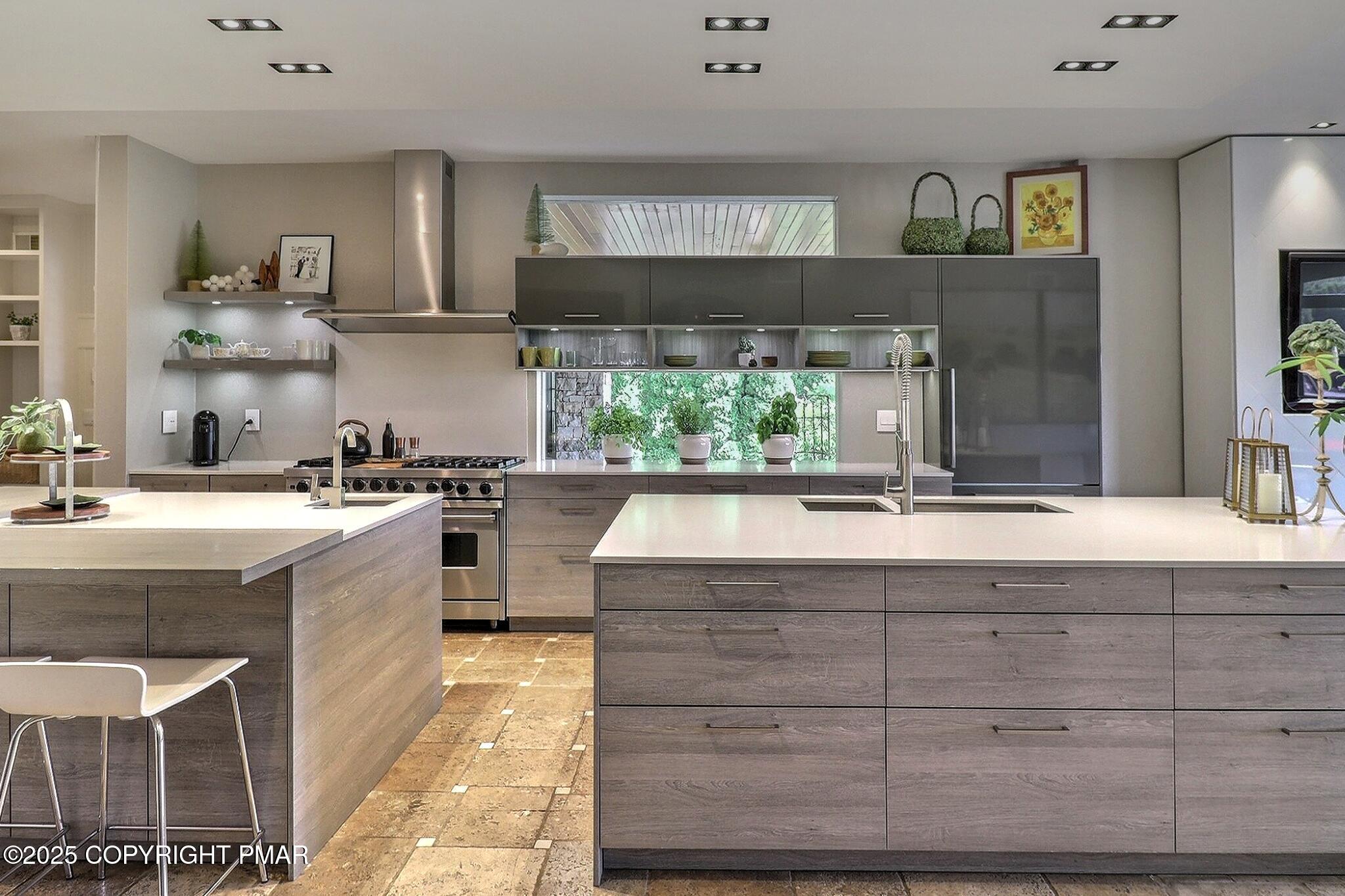 1212 Burger Hollow Road Effort, PA 18330 - Photo 35 of 138 a kitchen with kitchen island granite countertop a sink stainless steel appliances and cabinets