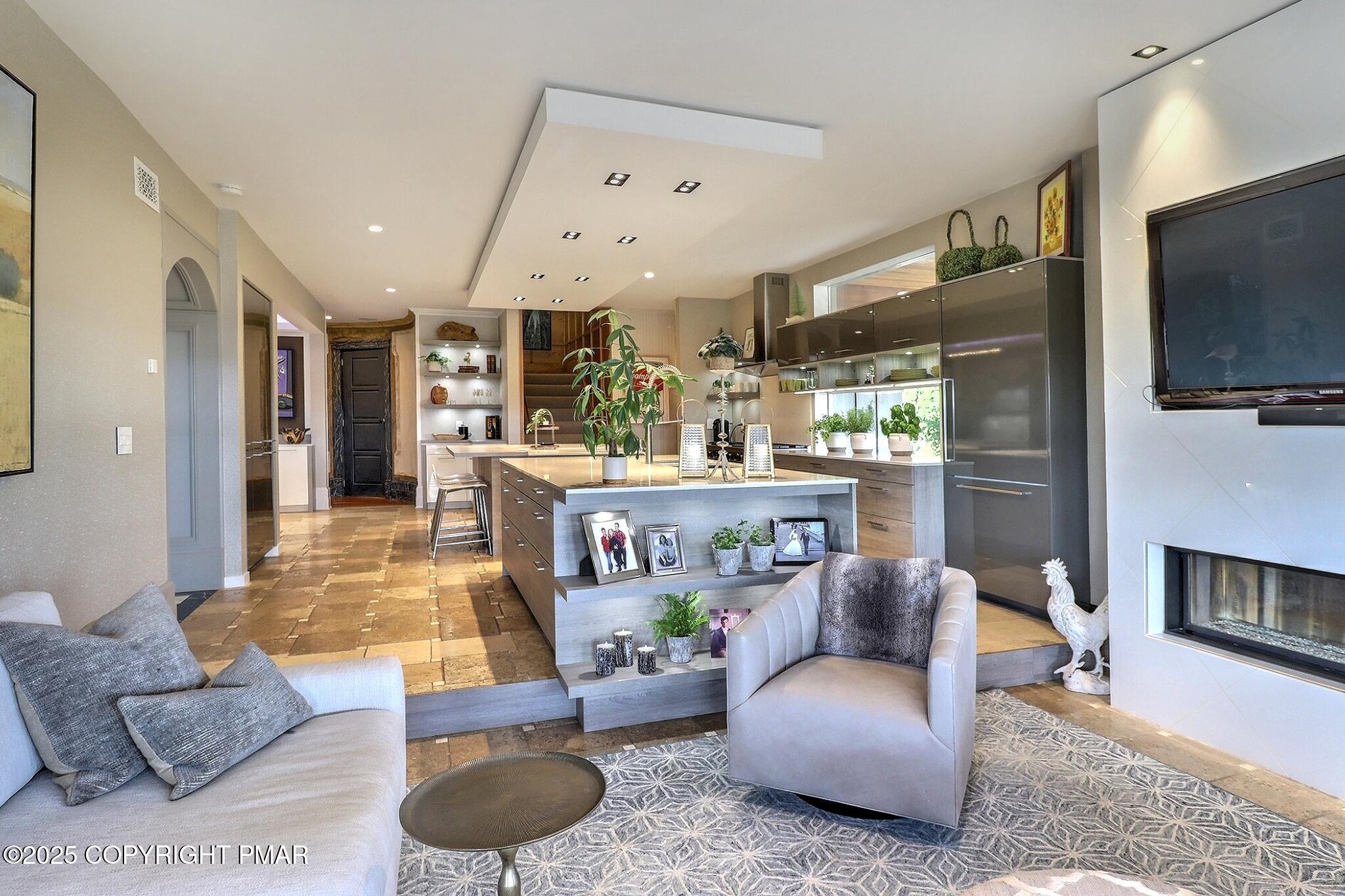 1212 Burger Hollow Road Effort, PA 18330 - Photo 38 of 138 a living room with furniture and a flat screen tv
