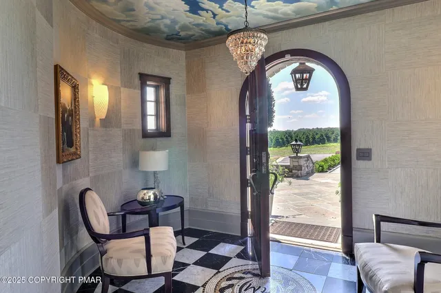 a white toilet sitting next to a bathroom sink