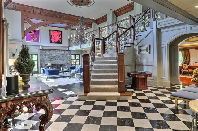 a bedroom with a large bed and a couch