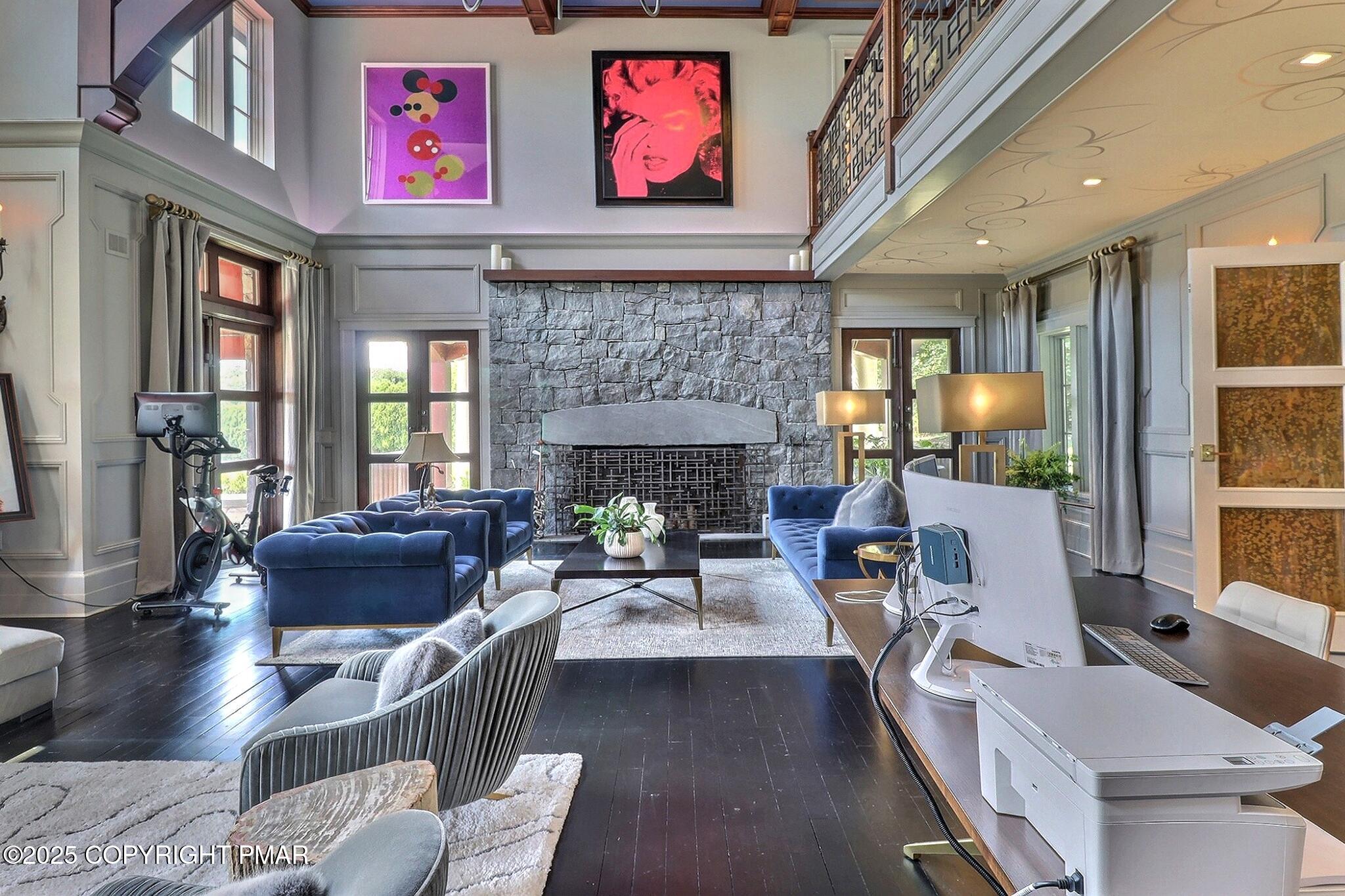 1212 Burger Hollow Road Effort, PA 18330 - Photo 50 of 138 a living room with furniture and a fireplace