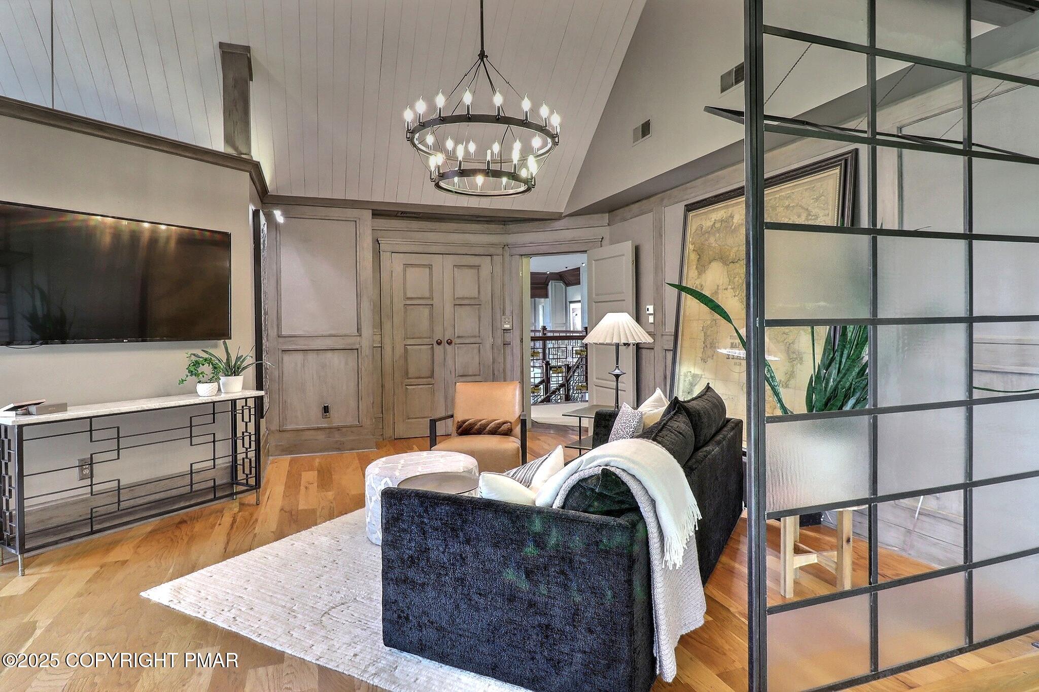 1212 Burger Hollow Road Effort, PA 18330 - Photo 75 of 138 a living room with furniture and a flat screen tv