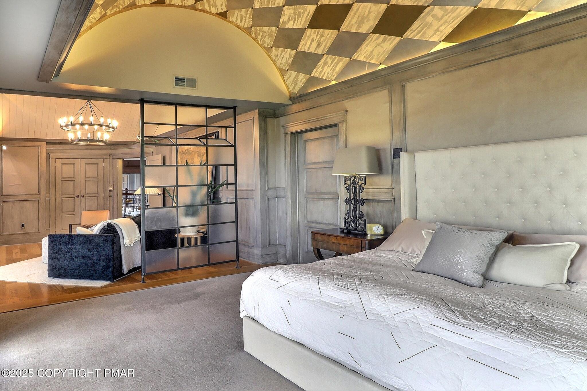 1212 Burger Hollow Road Effort, PA 18330 - Photo 82 of 138 a bedroom with a large bed and a balcony view