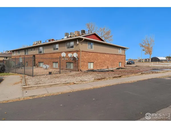 a view of a house with a street