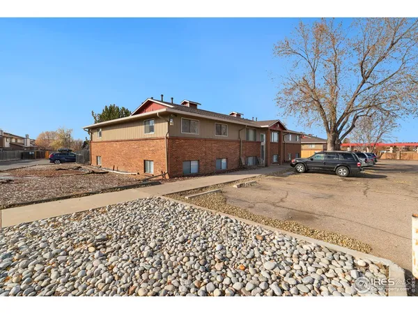 a black white house with a outdoor space