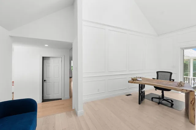 a view of a living room and dining room